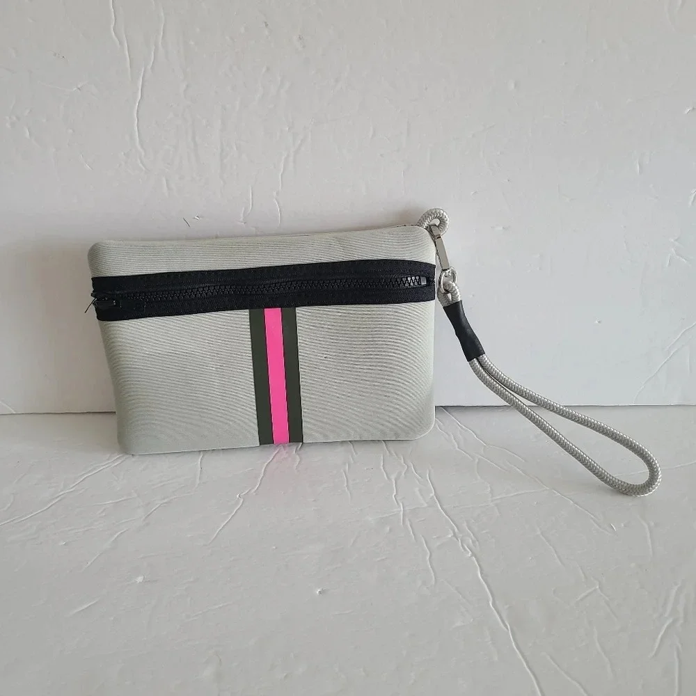 Haute shore  gray /pink striped clutch/wristlet sz.8×5 in. (J)